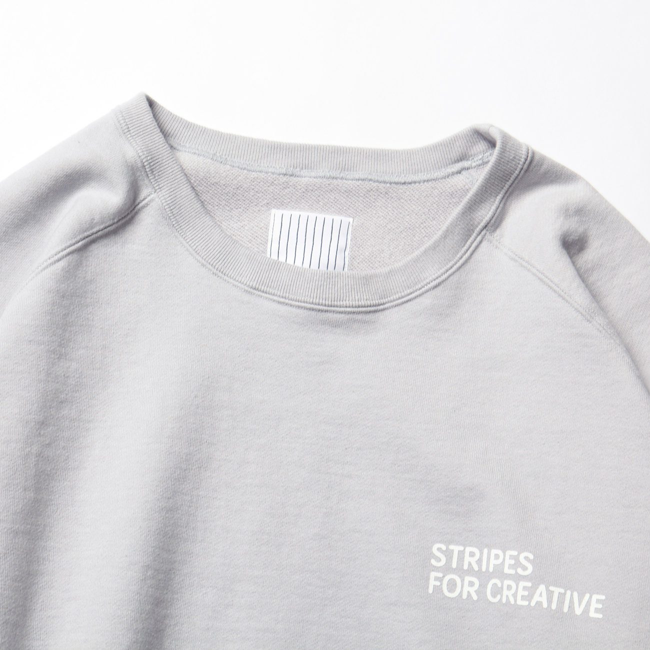 S.F.C Stripes For Creative / エスエフシー | RAGLAN CREW SWEAT