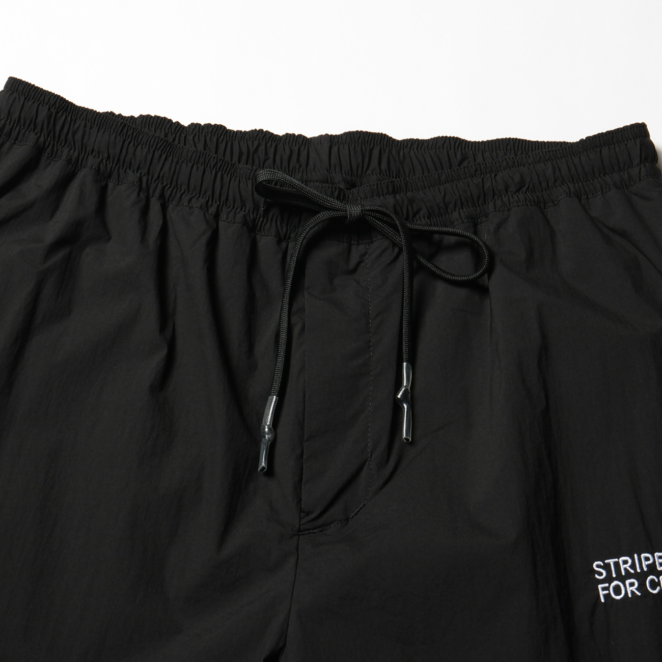 WINDBREAKER PANTS - Black