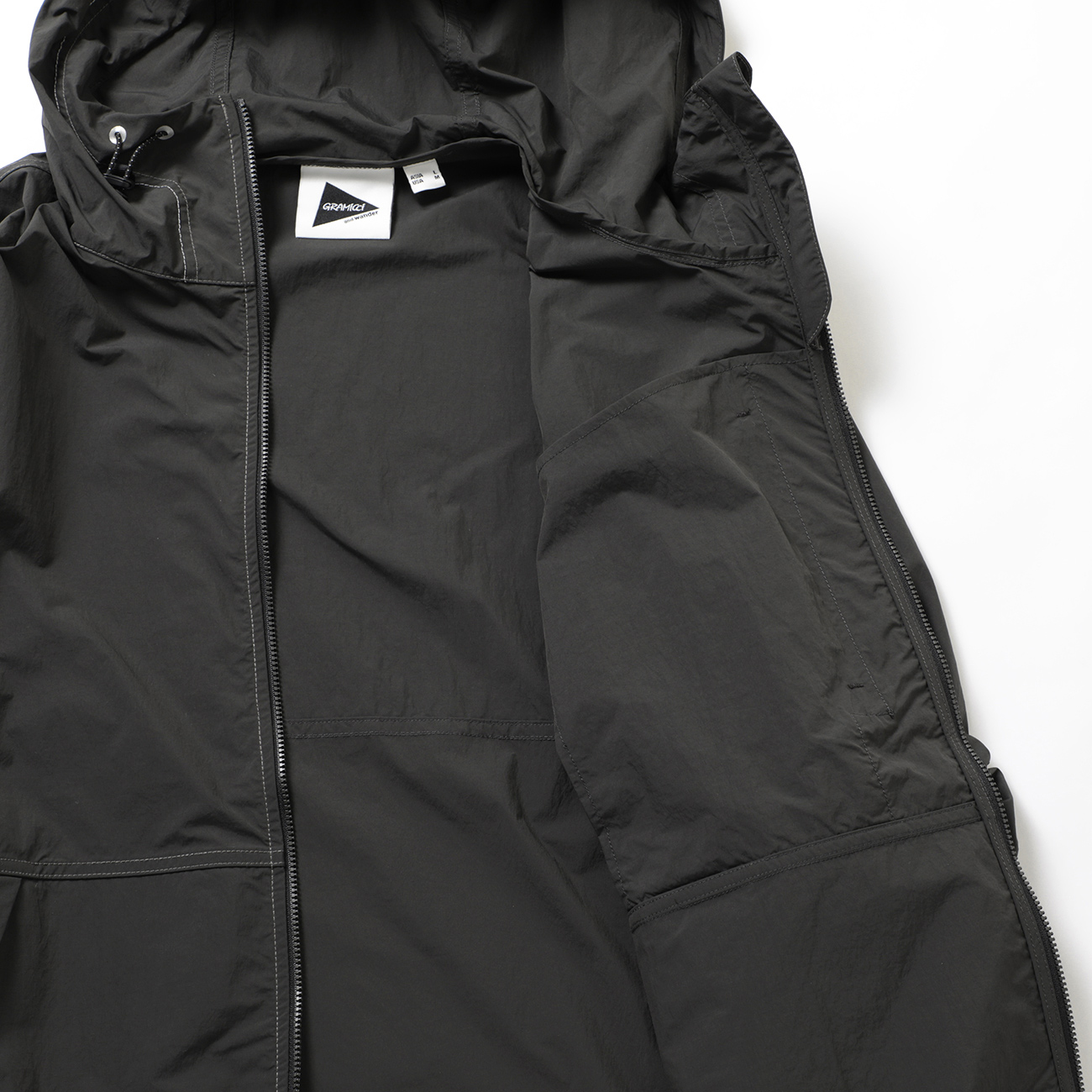 and wander / アンドワンダー | gramicci brushed nylon jacket