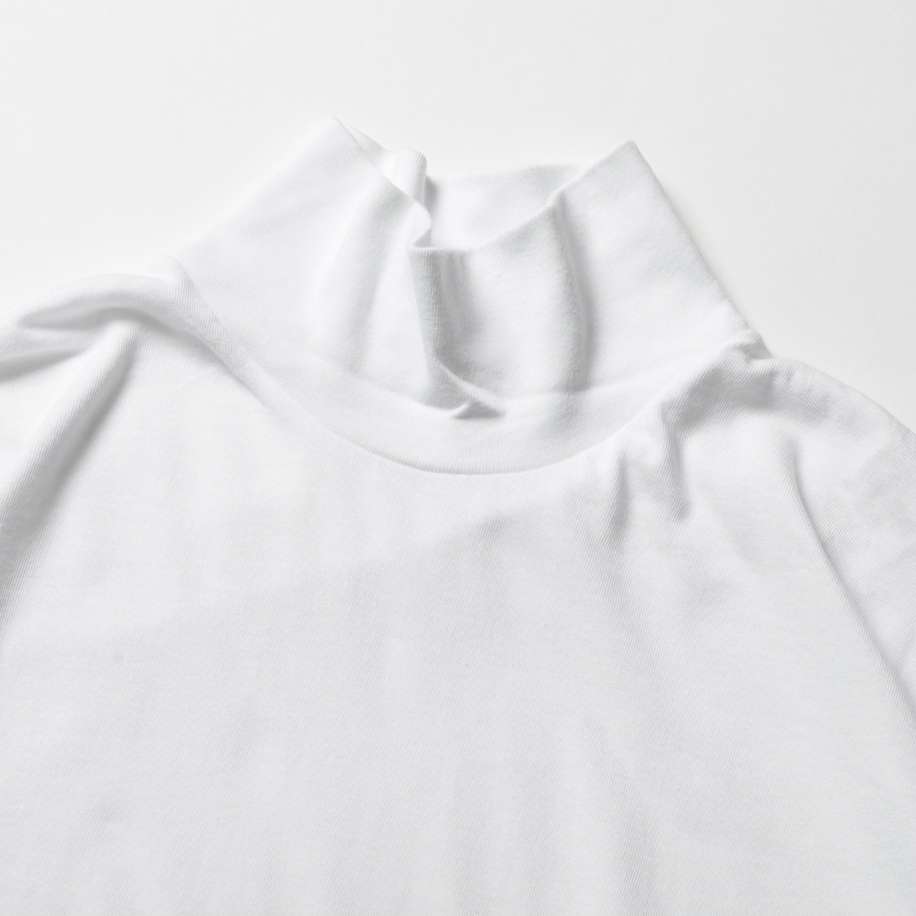 AURALEE SEAMLESS HI NECKホワイト　長袖Tシャツ AURALEE / オーラリー | SEAMLESS HI NECK L/S TEE (メンズ